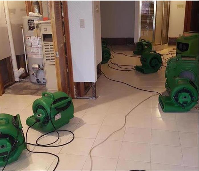 cleaned tile floor, green air movers working